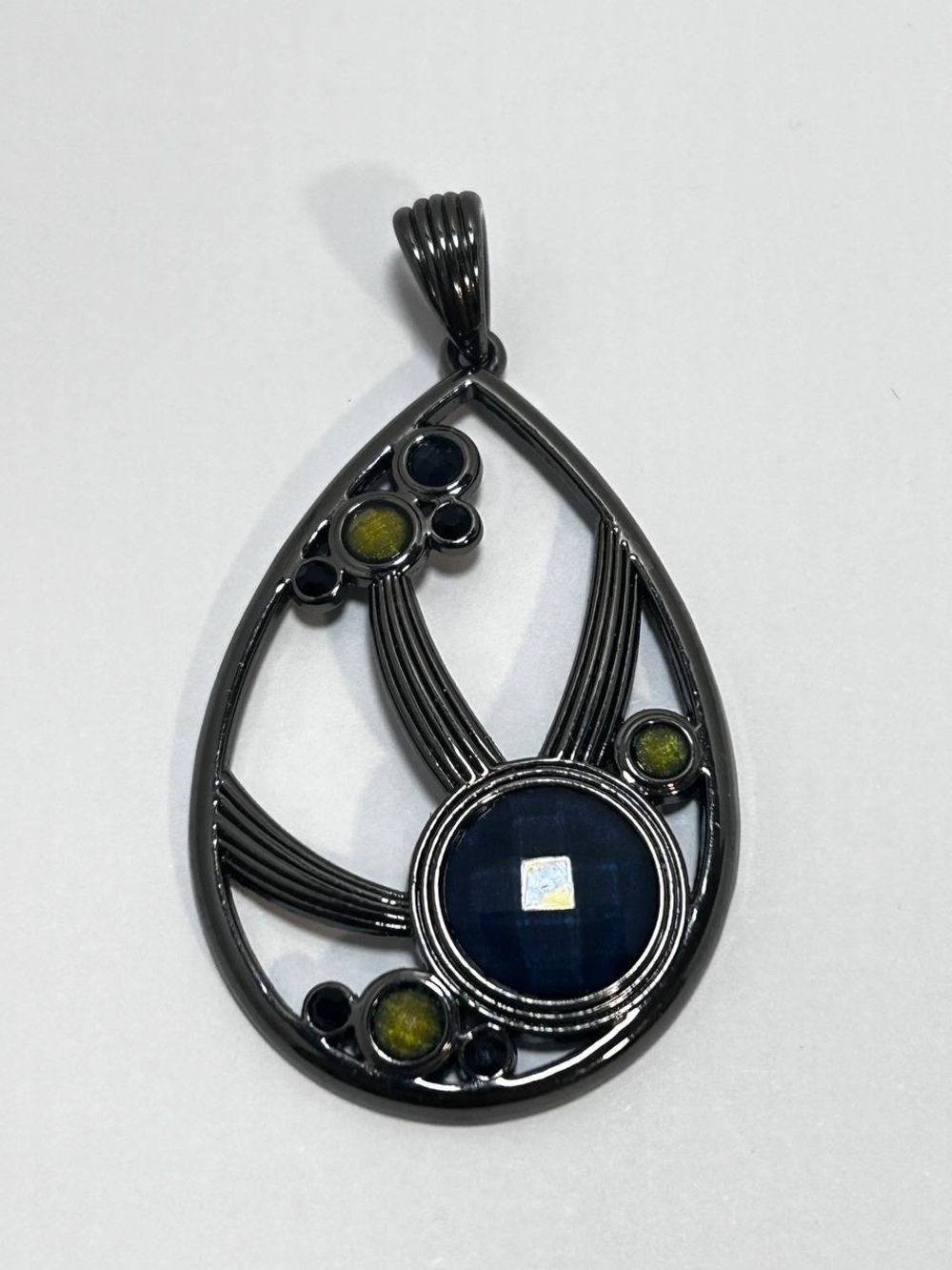Gorgeous collectible teardrop with dark blue and green pendant by Lia Sophia